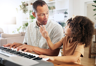 Buy stock photo Piano, learning and girl with grandfather in home, playing or bonding together. Wow surprise, education and shocked grandpa teaching kid how to play musical instrument, acoustic and electric keyboard