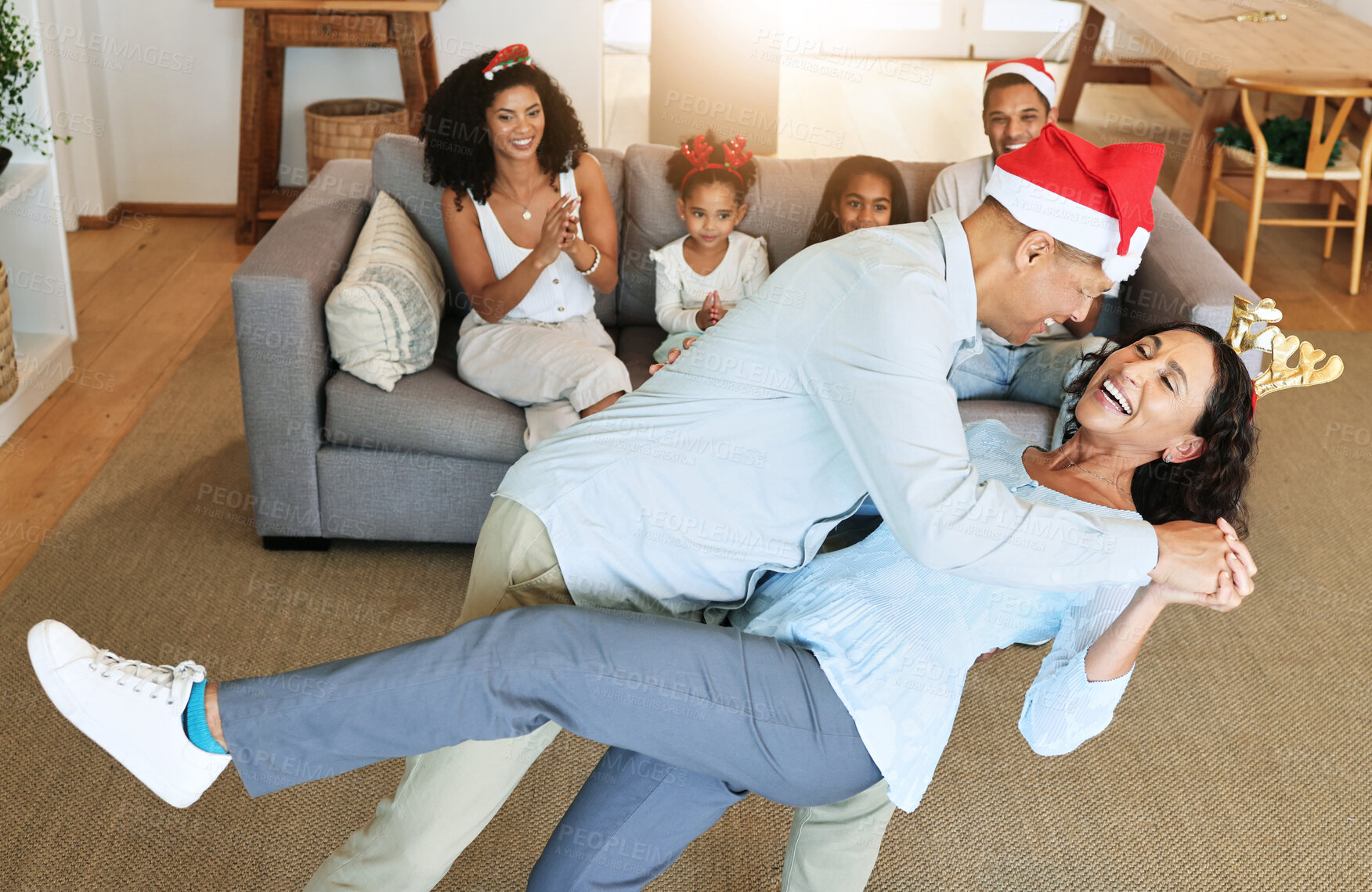 Buy stock photo Christmas dancing of happy senior family for celebration, joy and retirement lifestyle together at home. Excited, dance and children clapping for grandparents or mature people on thanksgiving holiday