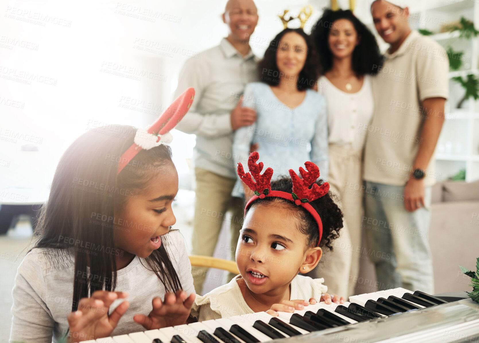 Buy stock photo Christmas, black family and kids playing the piano together in their home for music or festive celebration. Children, december and holiday with girl sister siblings in a house to play an instrument