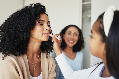 Buy stock photo Beauty, makeup and lipstick with mother and daughter for bonding, playing and affectionate. Care, happiness and relax with black woman and child in family home for cosmetics, happy and grooming