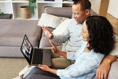 Buy stock photo Couple, laptop and wave for video call on home sofa for communication and network connection. Man and woman in living room with technology for virtual conversation hello during distance family chat