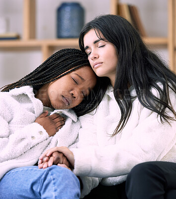 Buy stock photo Sad, friends and hug with women on sofa in living room for comfort, grief and depression. Mental health, emotional support and care with girl consoling at home for solidarity, sympathy and worry