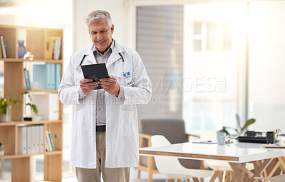 Tablet, hospital office and senior doctor online for research, telehealth and medical consulting. Healthcare, clinic and male health worker on digital tech for patient data, wellness app and internet