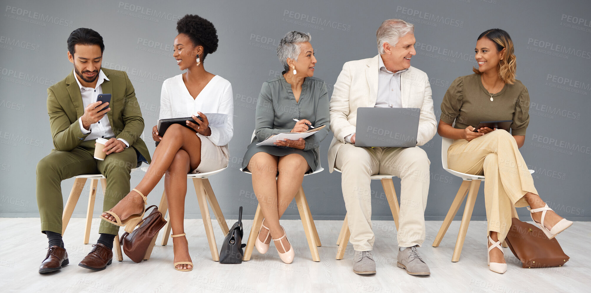 Buy stock photo HR, technology and business people waiting in line for a recruitment interview. Hiring, resume or cv with a man and woman employee sitting in a human resources candidate line for opportunity