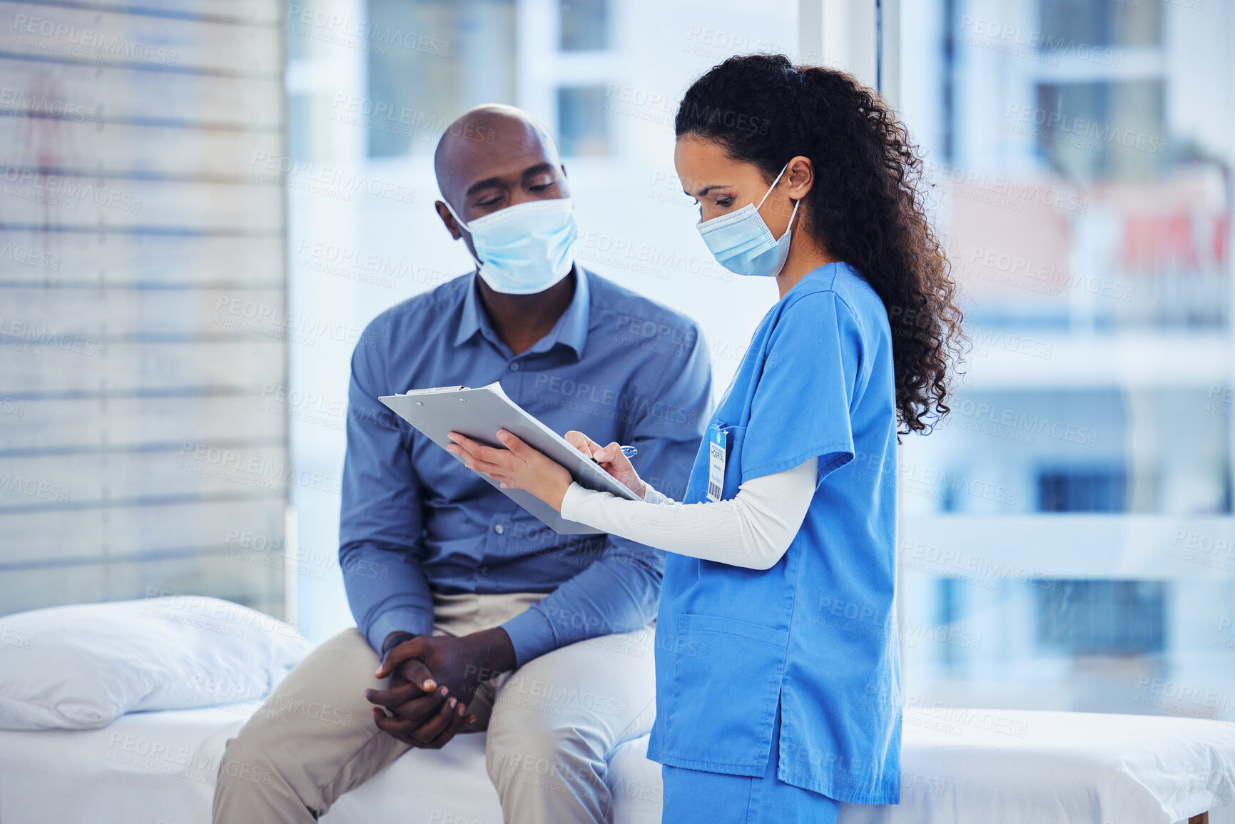 Buy stock photo Doctor consultation, mask and patient results of a nurse with a black man in a hospital. Clinic, covid conversation and nursing communication with medical data and healthcare discussion for advice