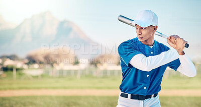 Sports, baseball and man with bat in action ready to hit ball in game, practice and competition on field. Fitness, action and male athlete outdoors for exercise, training and workout for sport match