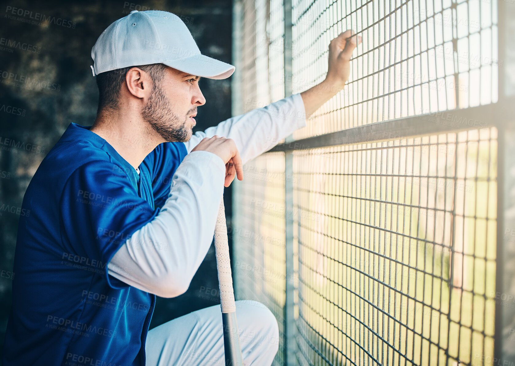 Buy stock photo Baseball, dugout and man watching game holding bat, concentration, competition and sport. Fitness, health and serious sports player waiting for turn to play in fun practice match at stadium or field.