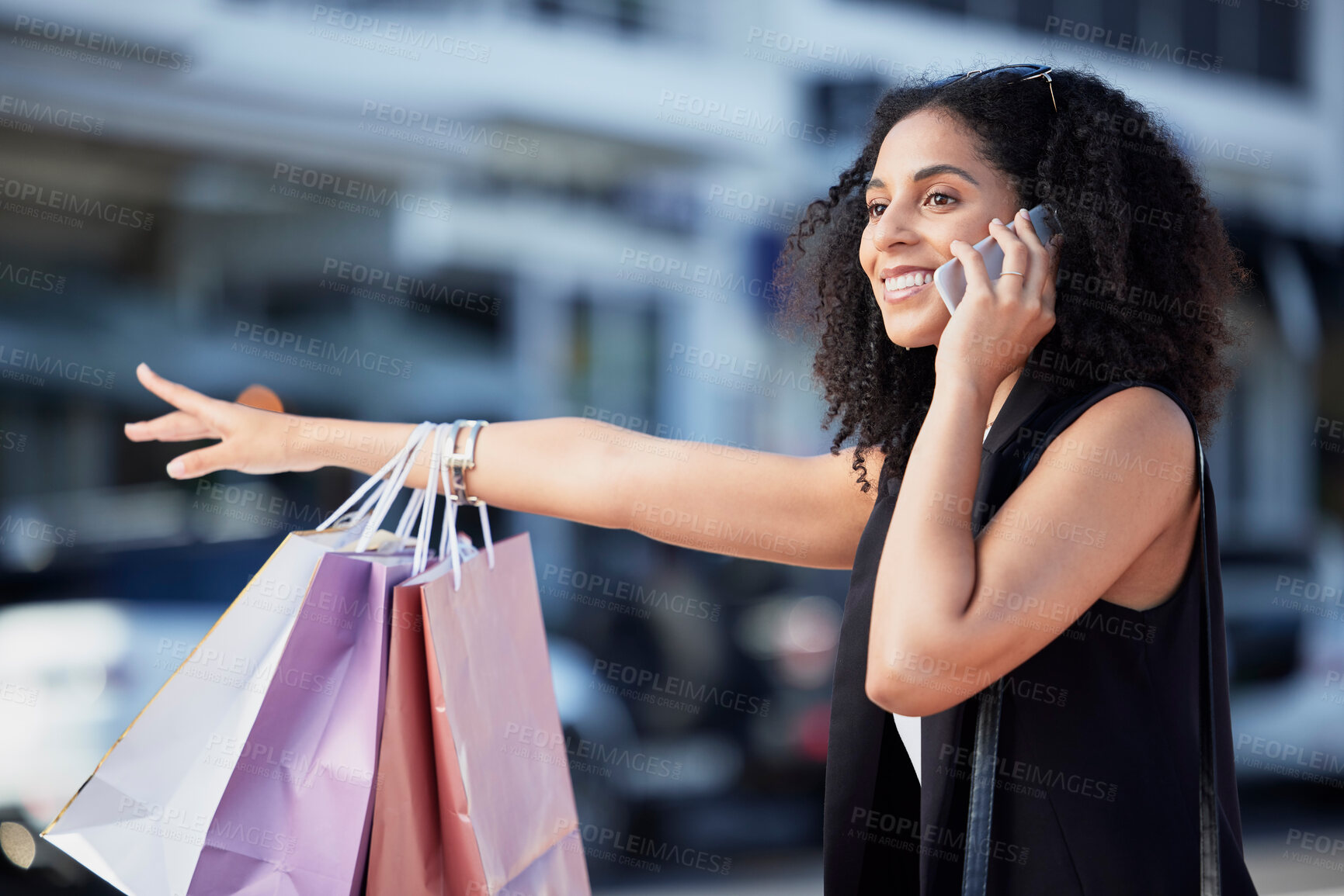 Buy stock photo Black woman, shopping bag and phone call of a customer looking for a taxi outdoor in the city. Fashion sale, boutique sale and retail store promotion of a happy person with mobile communication 