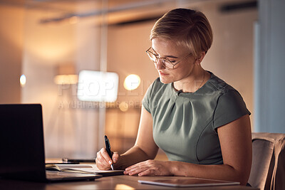 Buy stock photo Serious woman, notebook or writing in night office for company planning, business schedule or ideas management. Corporate, worker or employee with book, pen or technology for evening project agenda