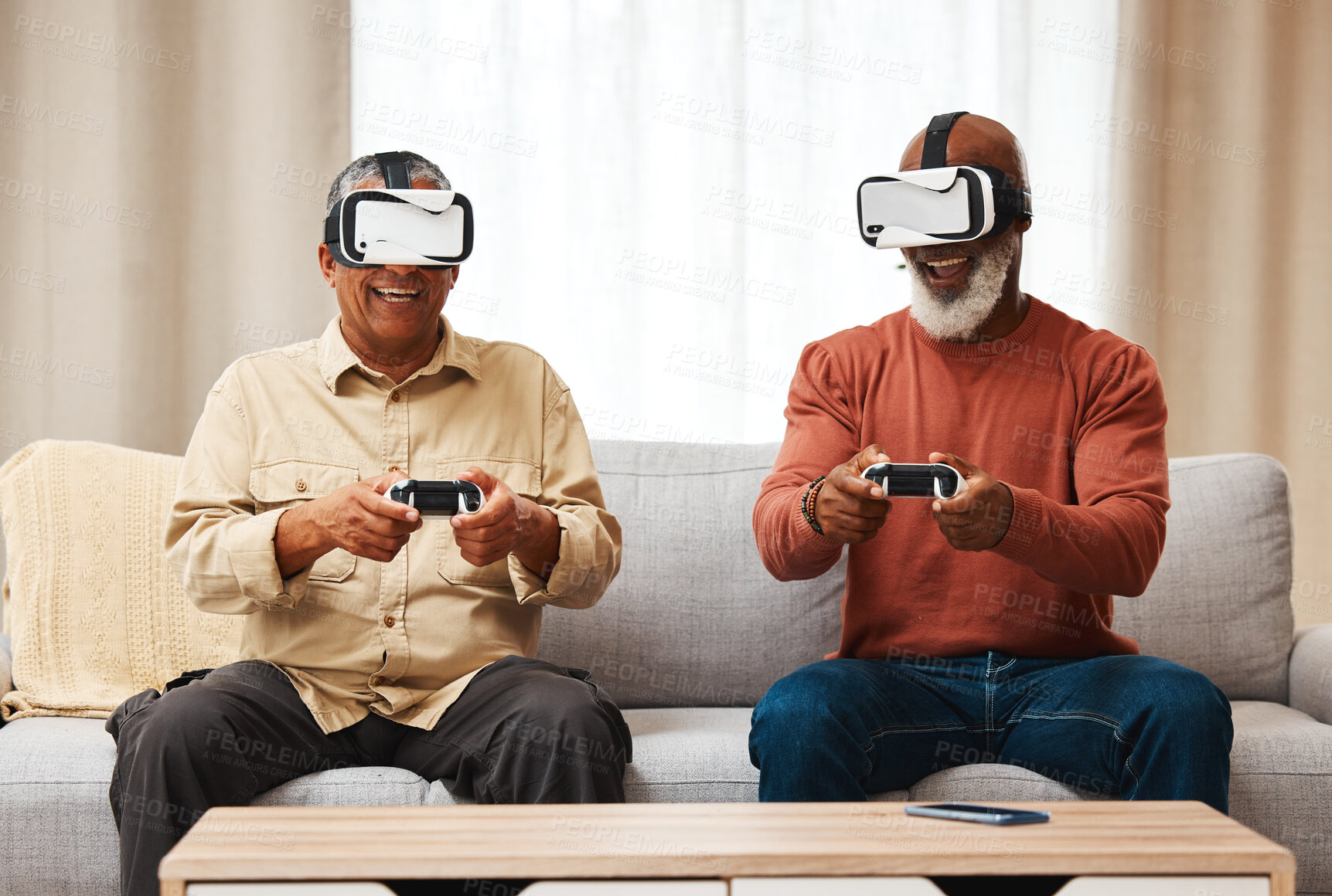 Buy stock photo Friends, vr and senior men gaming in home on sofa in living room while laughing. 3d virtual reality, metaverse gamer and smile of happy retired people playing fun futuristic games with controller.