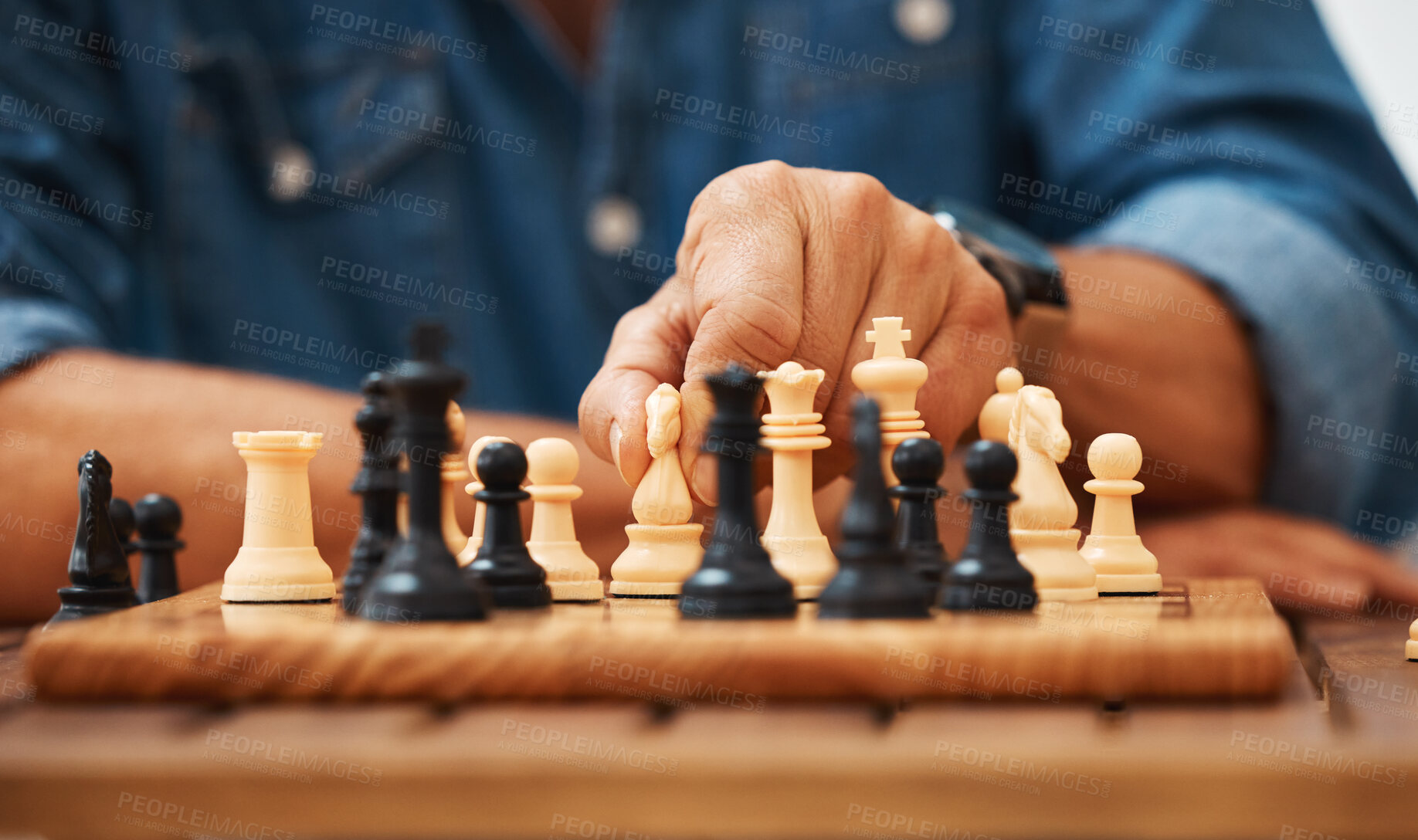 Buy stock photo Chess, play and hands with a knight on a board game with a strategy in home competition. Checkmate, chessboard and smart man or male playing in a sports contest or problem solving challenge for mind.