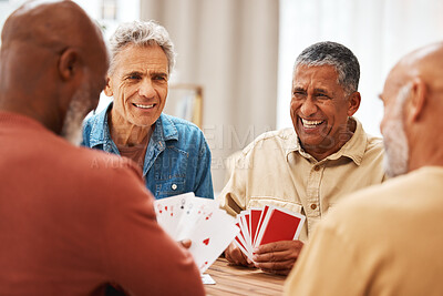 Buy stock photo Senior man, friends and laughing for card games on wooden table in fun activity, social bonding or gathering. Group of happy elderly men with cards for poker game enjoying play time together at home