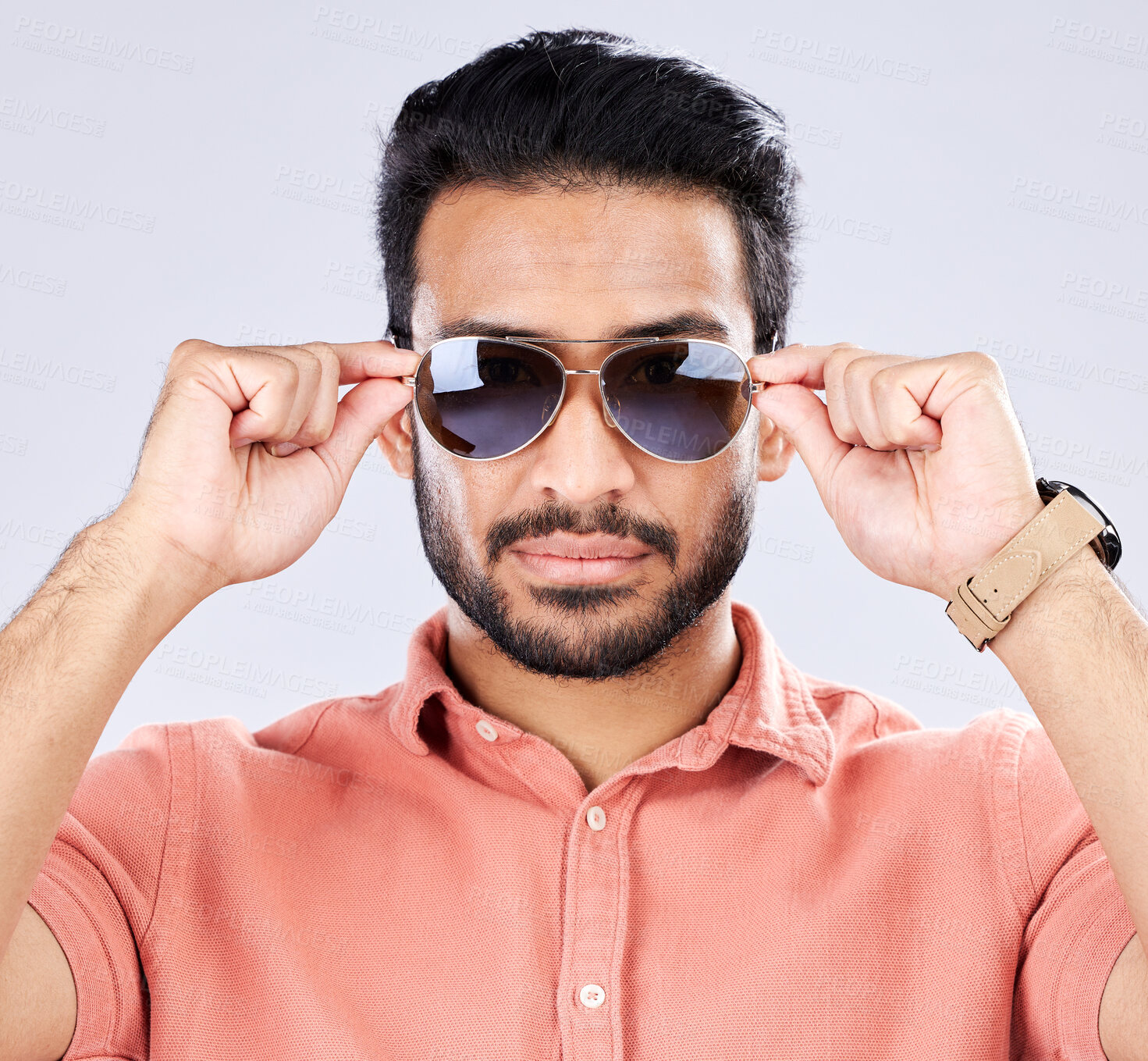 Buy stock photo Portrait, sunglasses and man with fashion, trendy and casual clothes against grey studio background. Face, male or gentleman with eyewear, cool or edgy with style, confidence or carefree with success