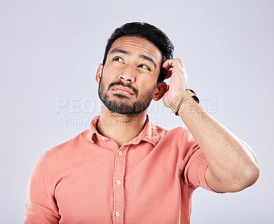 Buy stock photo Confused, thinking and Asian man with gesture for an idea isolated on a grey studio background. Doubt, frustrated and Japanese person with memory loss, confusion and contemplation on a backdrop