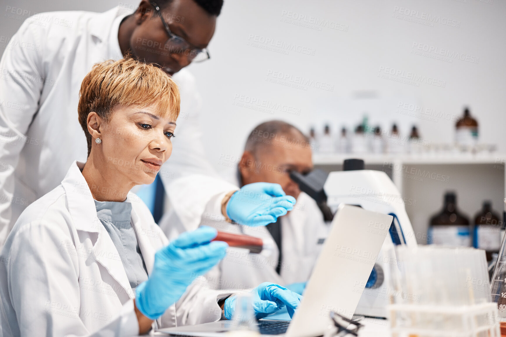 Buy stock photo Research, team and science in laboratory, tablet and conversation for experiment, sample and update results. Science, man and woman with test tube, device and planning for healthcare and discussion