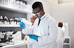 Science, research and black man in laboratory with tablet for medical analysis and digital innovation in medicine. Pharmaceutical analytics, web and scientist in South Africa checking results online.