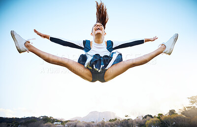 Buy stock photo Cheerleader woman, sky and sports performance with smile and energy to celebrate outdoor. Cheerleading person dance or jump stunt while laughing with joy for training workout, freedom or competition