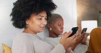 Social media phone, home relax and friends in communication on mobile app, search the internet and smile for notification. African women on the living room sofa with mobile internet connection