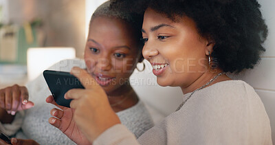 Phone chat, web social media and friends happy in communication on the internet, search on mobile app and talking with technology on the sofa. Black women with smile for smartphone in the house