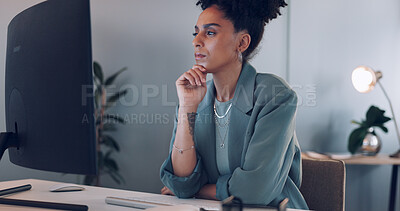 Computer, thinking and black woman typing in office writing email at night. Working late, planning and female worker with solution working on sales, advertising or marketing ideas, report or proposal