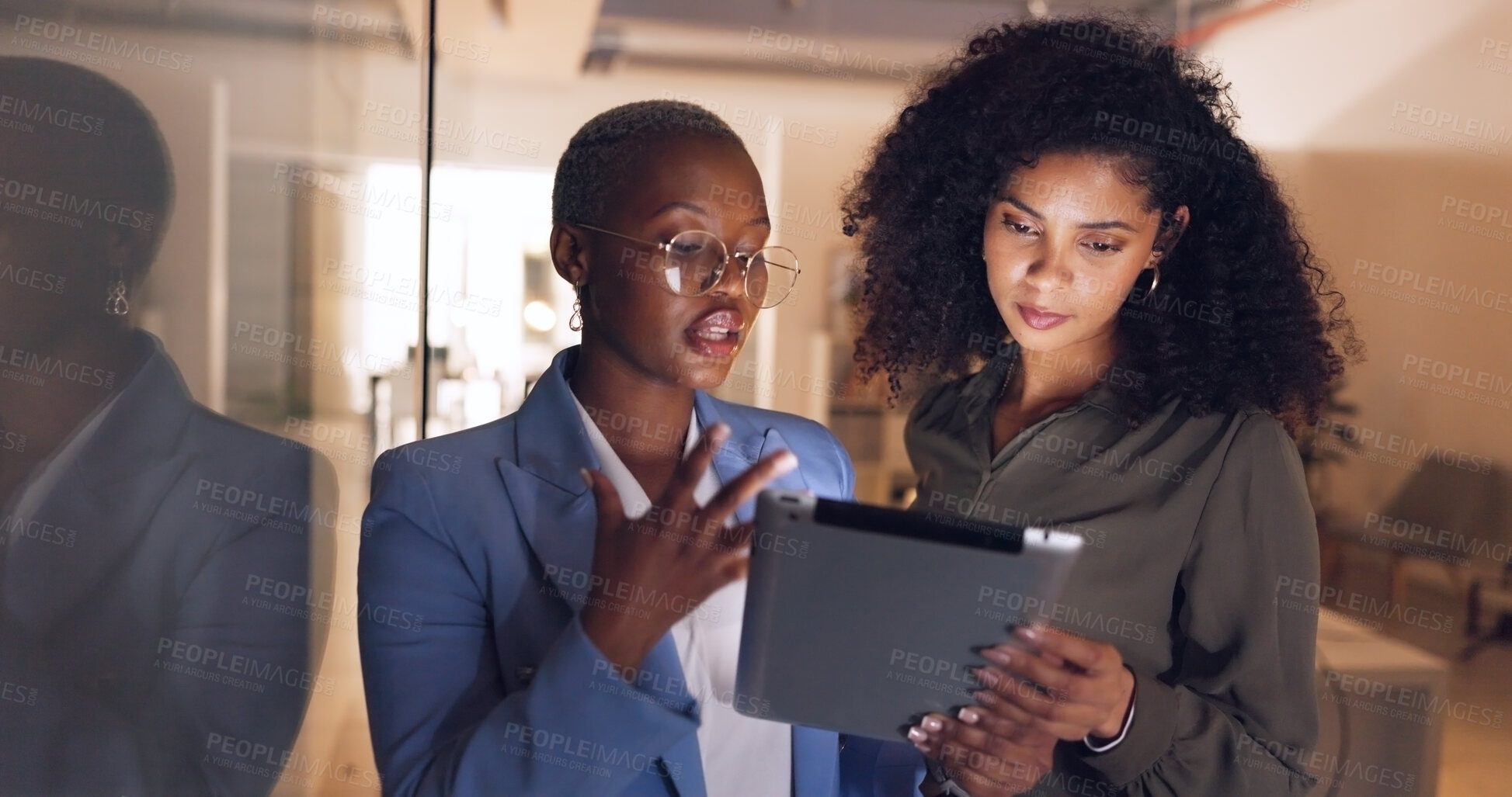 Buy stock photo Business woman, tablet and planning at night in teamwork, schedule or collaboration at office. Female person or employees working late in team research or project deadline together at workplace