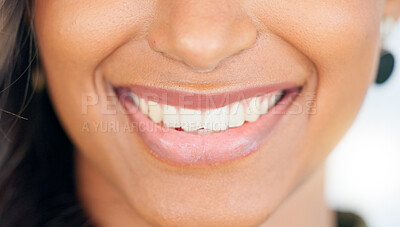 Smiling, beautiful and fresh female face winking feeling fun, silly and playful. Portrait of a happy woman head with perfect skin and healthy teeth. Closeup of a carefree natural beauty with a smile