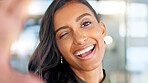 Smiling, beautiful and fresh female face winking feeling fun, silly and playful. Portrait of a happy woman head with perfect skin and healthy teeth. Closeup of a carefree natural beauty with a smile