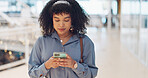 Phone, smile and black woman in a shopping mall reading social media, web and mobile internet text. Happy online communication, online shopping and mobile phone webpage sale of a woman on a app