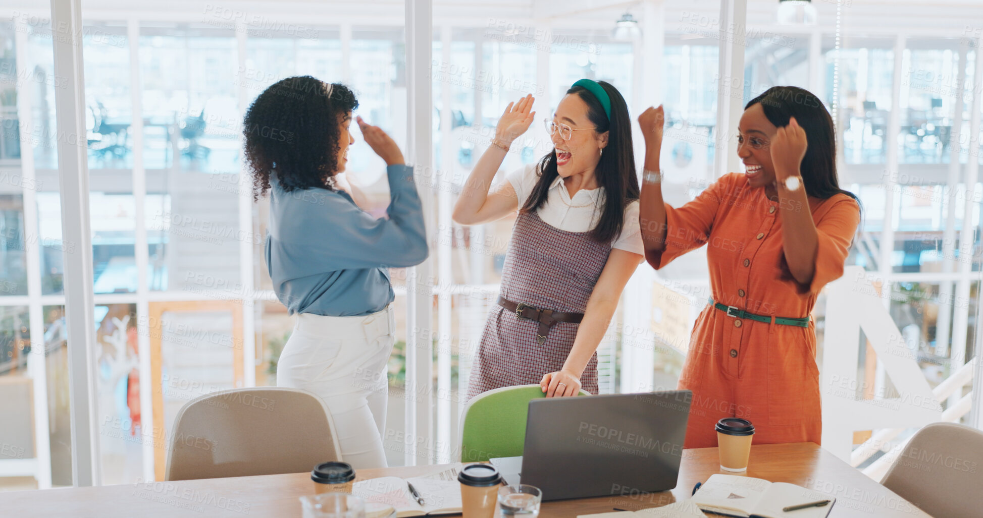 Buy stock photo Success, high five and business people in support for celebration, winning and deal on laptop. Women, diversity and excited employees celebrate achievement, teamwork and good news in creative agency
