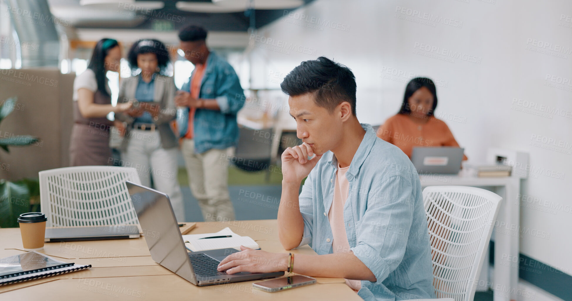 Buy stock photo Asian man in office, thinking and typing on laptop for market research, email or online report at startup. Creative businessman in coworking space with computer, web search and ideas at tech agency.