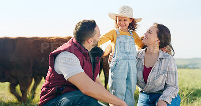 Family, farm and agriculture with a girl, mother and father on a field or meadow of grass with cattle. Sustainability, love and children with a man, woman and daughter on a farmer ranch together