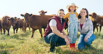 Farm, portrait and family bonding in nature, looking at animals and learning about livestock. Farming, agriculture and farmer parents bonding with girl on sustainable cattle business, relax and happy