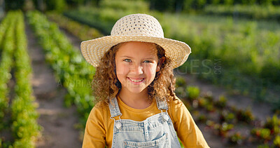 Agriculture, portrait and girl child on farm ready to help with farming or harvest. Sustainability, agro and happy little girl or kid in straw hat on land learning how to plant vegetables or plants.