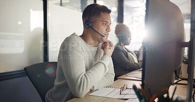 Call center, consulting and communication with businessman writing for telemarketing, customer service or contact us. Sales, crm and technical support with employee in help desk agency for networking