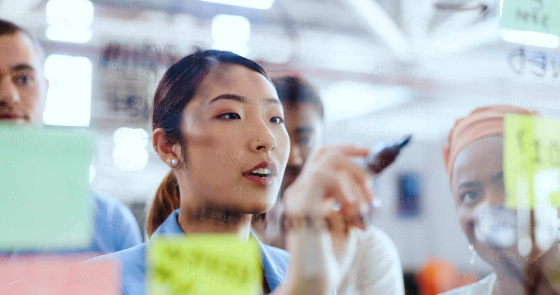 Buy stock photo Brainstorming, board and businesswoman in meeting in office with sticky notes for planning with teamwork. Discussion, career and designers working on creative project for problem solving in workplace