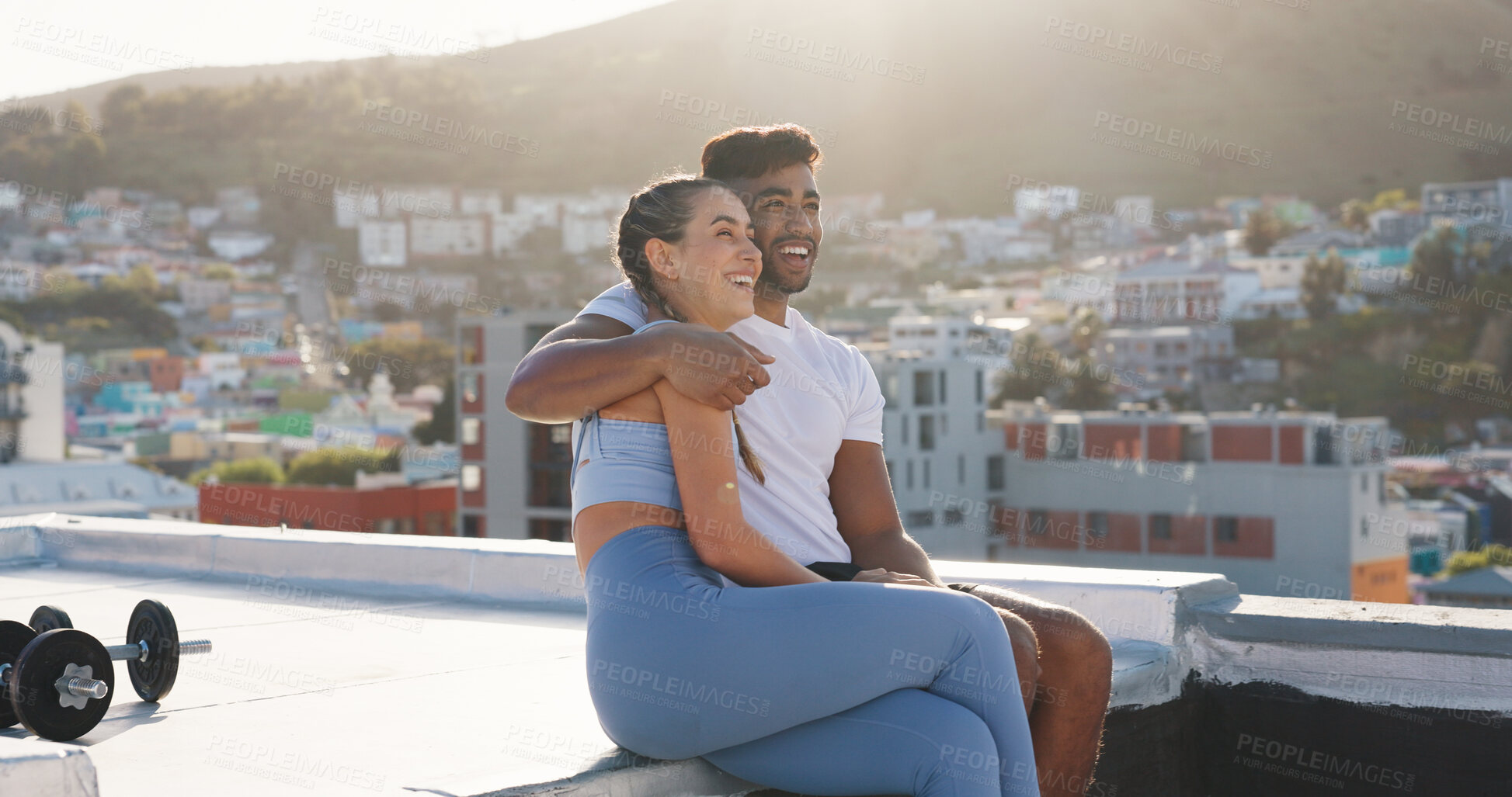 Buy stock photo Fitness, couple and city to rest for exercise, workout or training together on a building rooftop. Happy man and woman on sports outdoor break with smile, communication or conversation in Cape Town