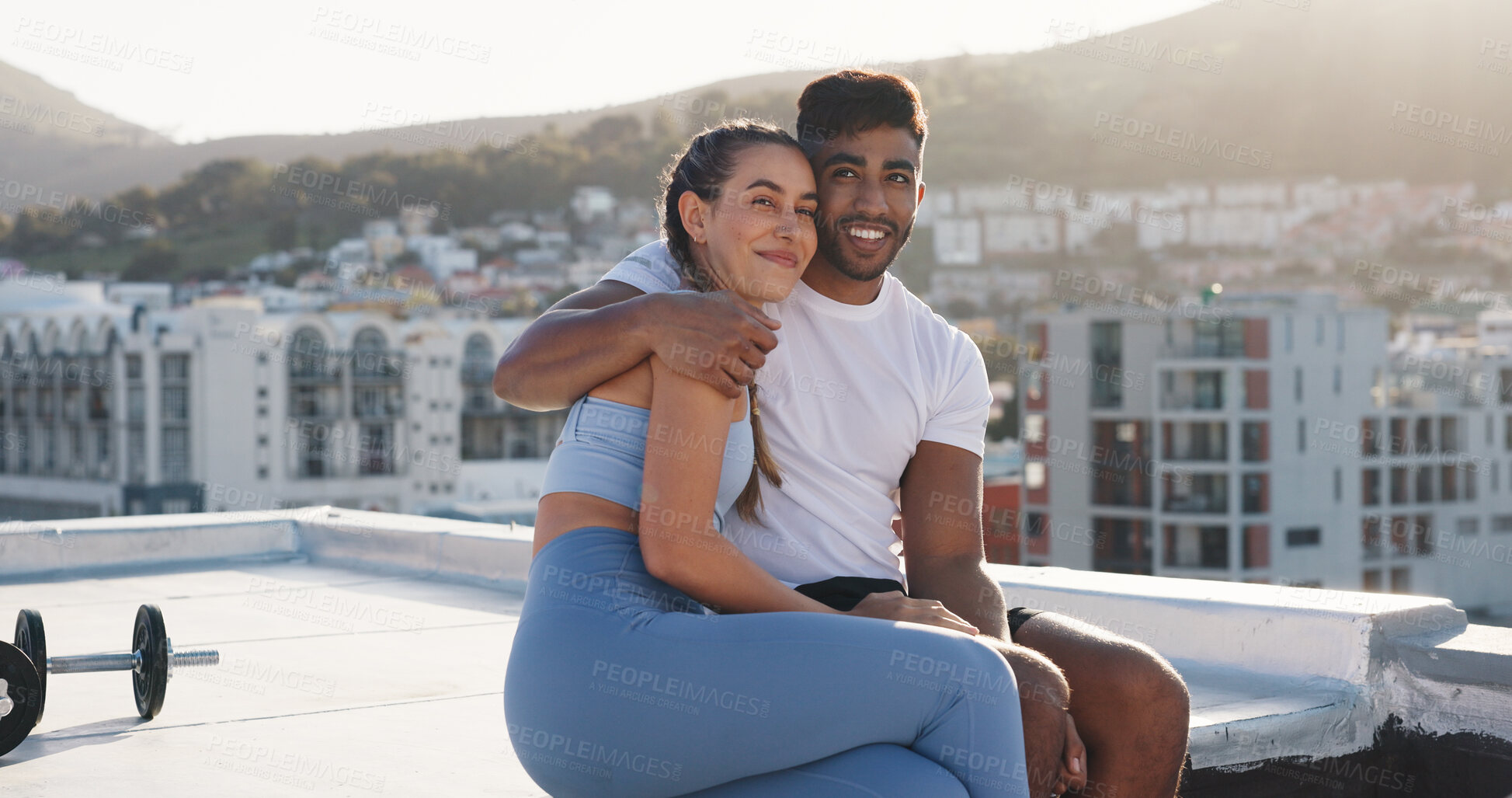 Buy stock photo Fitness, couple for hug during exercise, workout or training together in the urban city. Happy woman, man and care in a conversation, communication or talking after cardio break on a rooftop