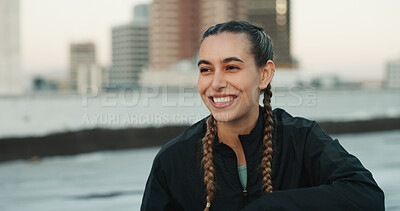 Buy stock photo Fitness, smile and woman athlete in the city for a health, wellness and cardio workout or exercise. Happy, sports and young female person on a rest or break after training on rooftop in urban town.