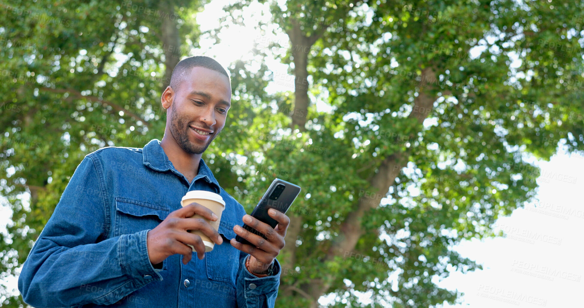 Buy stock photo Black man, coffee and phone for communication, email or online networking ideas with smile outdoor in nature. Happy business person, smartphone and technology for mobile chat app, feedback or scroll