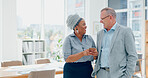 Woman, phone and businessman for social media, laughing and funny meme in finance office. Happy senior executive, black woman and smartphone for joke, social network or conversation on lunch at work