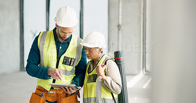 Construction, tablet and collaboration with an architect and engineer working as a team together on a building site. Teamwork, communication or technology with a man and woman at work in architecture