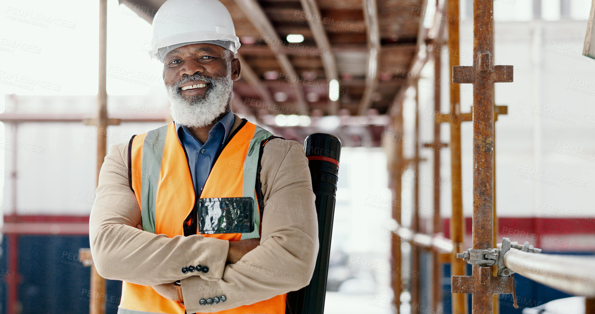 Buy stock photo Crossed arms, industry and portrait of black man engineer with a smile on scaffold on site. Industrial, confidence and senior construction worker or contractor for building maintenance inspection.