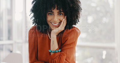 Face, vision and mindset with a business black woman sitting at a desk with her hand on her chin. Portrait, happy and smile with a female employee thinking about future growth or company development