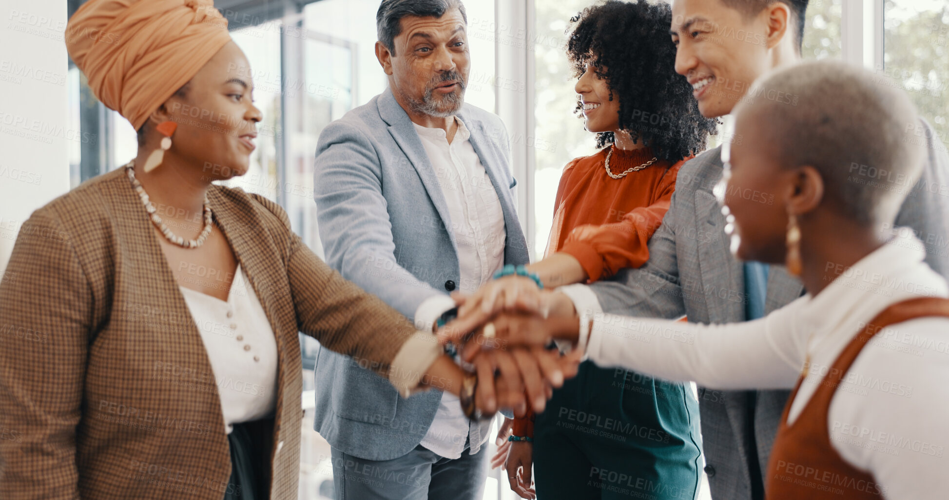 Buy stock photo Happy creative people, hands together and team building in support, trust or motivation at office. Group of employees piling in huddle, goals or teamwork in meeting, unity or achievement at workplace