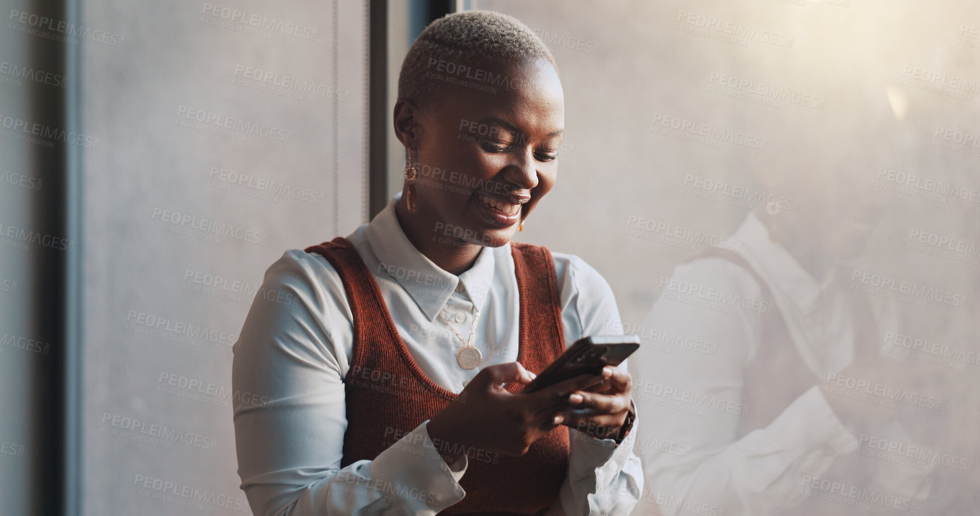 Buy stock photo Happy, smile and a black woman on a phone at work for communication or social media. Technology, laughing and African female employee networking on a mobile app or the internet on break in office