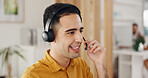 Contact us, call center and crm, man at computer in modern office, customer service agent with headset and smile. Help desk, telemarketing or sales consultant, happy advisory support and consulting.