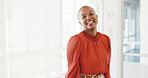 Success, motivation and a business black woman smiling standing alone in her office at work. Happy, laughter and positive mindset with a female employee smiling