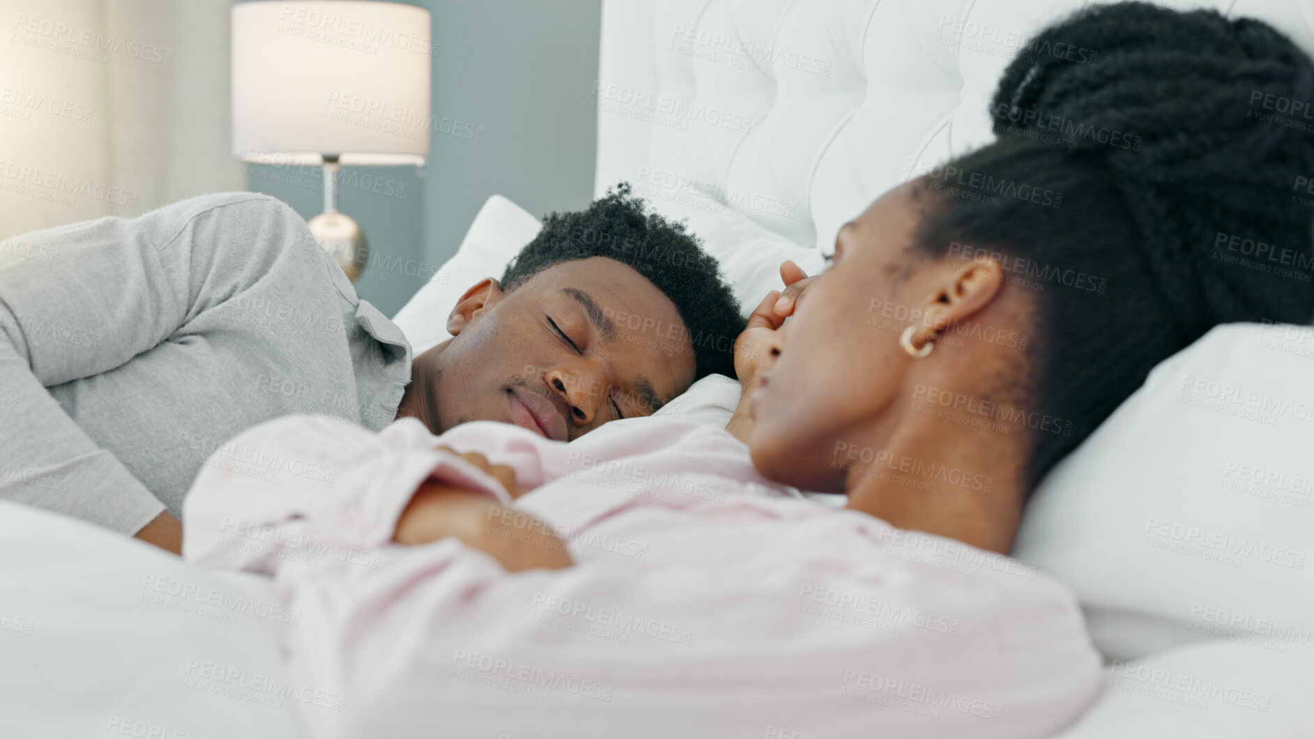 Buy stock photo Couple, insomnia and black woman in bed frustrated by snoring, crisis or sleep apnea at home. Sleeping, conflict and angry female with stress, anxiety or divorce depression, liar or bedroom problem