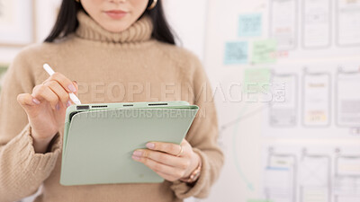 Woman, tablet and ui ux design with the developer being creative for mobile app project with a pen in office. Female planning, web design and development of wireframe on storyboard for website idea