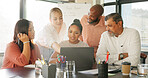 Laptop, collaboration and meeting with a business team working together on a project in the office. Teamwork, computer and diversity with a man and woman employee group talking in the boardroom